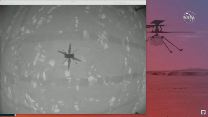 Ein Bild von der Kamera des Helikopters zeigt seinen eigenen Schatten auf dem Boden.
